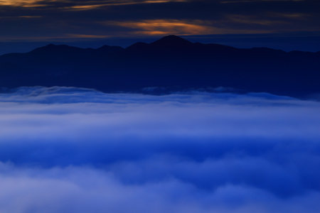 Foggy morning in the mountains. Landscape with a beautiful sky