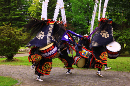 Unidentified Japanese woman in traditional costume at the annual Kamakura Festival.の写真素材