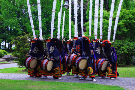 Unidentified Japanese woman in traditional costume at the annual Kamakura Festival.