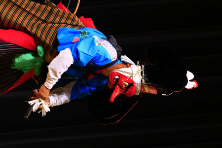 Tribal dancers perform in a traditional costume at the annual festival of folkloric dances.