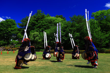 Unidentified dancers are performing Thai traditional dance in the parade in Nakhon Ratchasima, Thailand.の写真素材