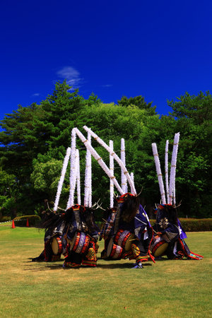 Unidentified dancers are performing Thai traditional dance in the parade in Nakhon Ratchasima, Thailand.の写真素材