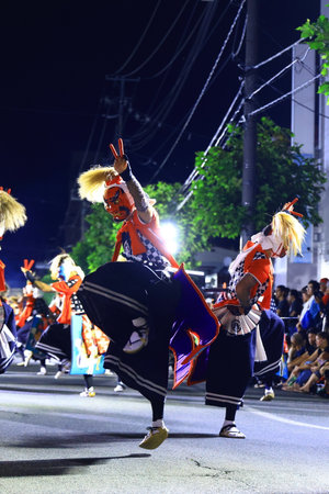 Unidentified dancers are performing Thai traditional dance in the parade in Nakhon Ratchasima,...