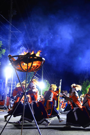 Unidentified dancers are performing Thai traditional dance in the parade in Nakhon Ratchasima, Thailand.の写真素材
