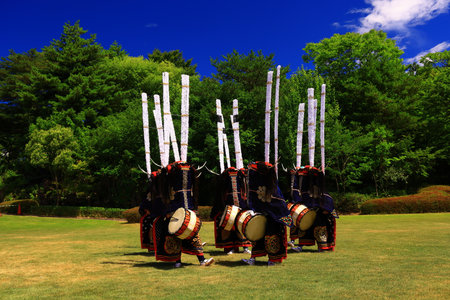 Unidentified dancers are performing Thai traditional dance in the parade in Nakhon Ratchasima, Thailand.の写真素材