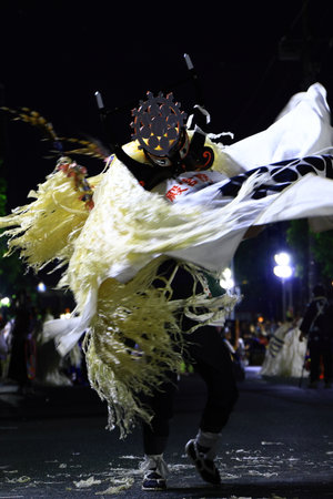 Unidentified dancers are performing Thai traditional dance in the parade in Nakhon Ratchasima, Thailand.の写真素材