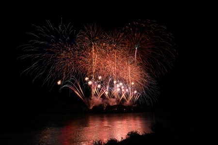 Fireworks on the bridge at night, Kanchanaburi, Thailandの写真素材