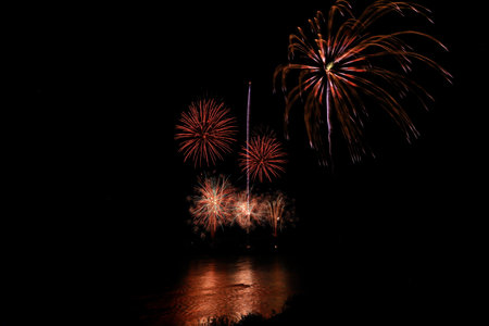 Fireworks on the bridge at night, Kanchanaburi, Thailandの写真素材