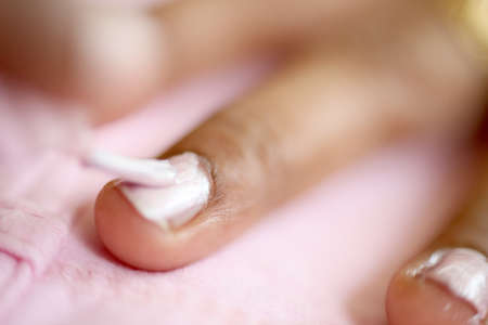 A nacro view of nail polishing with fingersの写真素材