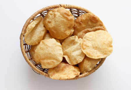 Indian breakfast poori  boori  in a basket