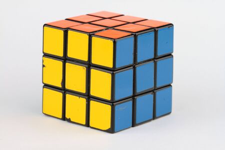 The old Rubik's cube on white background.のeditorial素材