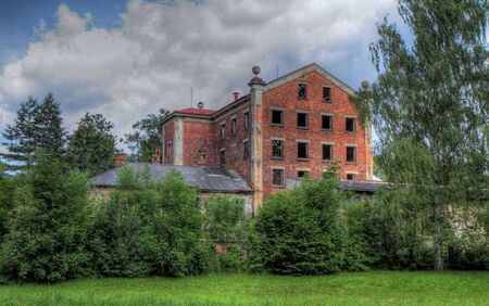 Old devastated hospital with park. HDR image.の写真素材