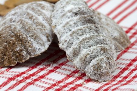 Close-up of Christmas sweet cakes on tablecloth.の写真素材