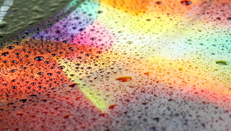 Abstract background made from colored vinyl from 1960s with drops of water.の写真素材