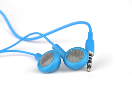 Blue headphones on a white background の写真素材