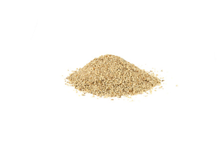 Heap of ground green coffee on white background.の写真素材