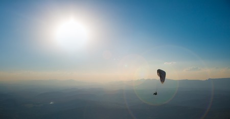 Paragliding into the sunset in Brazilの写真素材