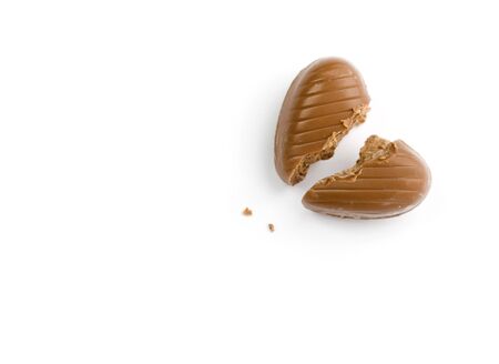 one broken chocolate heartの写真素材