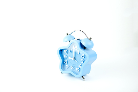 alarm clock blue on white background