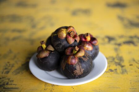Mangosteen fruits of Thailand sweet delicious popular and useful body, sale on the marketの写真素材