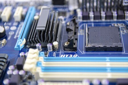 blue computer motherboard close up Electronic with microchips and transistors