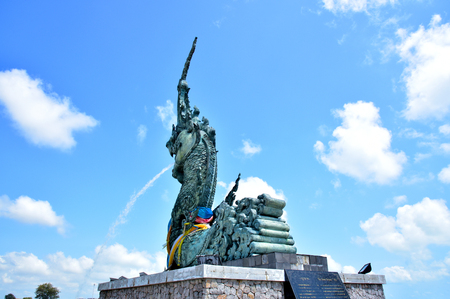 Naga sculptures spraying water A symbol of Songkhla Province, Thailand The floating Spraying water into the estuary lake is popular with tourists,Take pictures Songkhla Province,Thailand April 4, 2015のeditorial素材