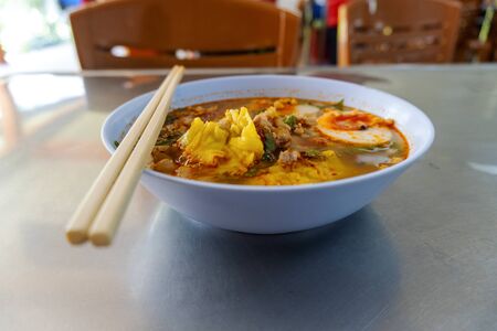 Delicious noodles hot and eggs with sour and spicy taste, popular in Thailandの写真素材