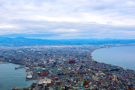 Scenery that looks down from mountains on a dark day in Japanの写真素材