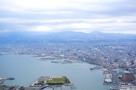 Scenery that looks down from mountains on a dark day in Japanの写真素材