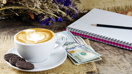 Cappuccino coffee and chocolate cookies. A cup of latte, cappuccino or espresso coffee with milk put...