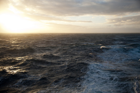 Drake passage at sunset on a cruise to Antarctica not that rough seaの写真素材