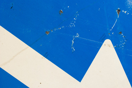 Partial of a strret sign arrow backgroundの写真素材