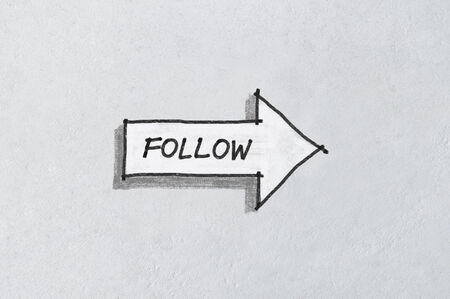 Concept of social media, follow arrow icon sketched on whiteの写真素材
