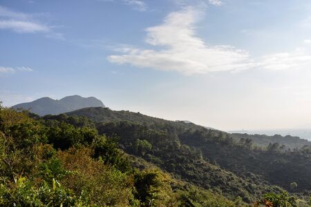 Rainforest Mountain range, view from hiking trails on Lamma Island, Hong Kongの写真素材
