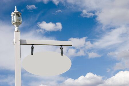 A vinyl oyster white oval sign with space for your prefered textの写真素材