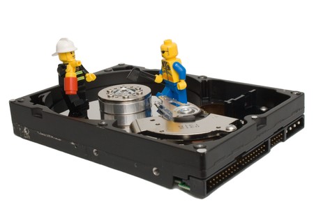 Men working on hard drive