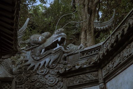 Stone dragon and monkeys in yuyuan garde. Shanghai, Chinaのeditorial素材