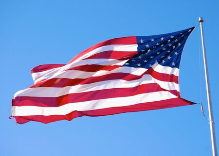USA Flag Waving over Texas Skiesの写真素材