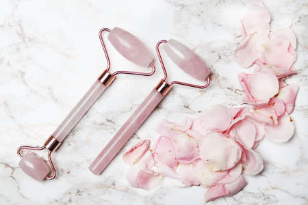 two rose quartz rollers, anti-wrinkle beauty treatment for firm skin