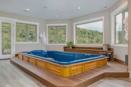 Amazing indoor spa area with current pool