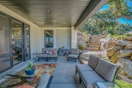 Amazing stone stairs and landscaping complimented with a covered patioの写真素材