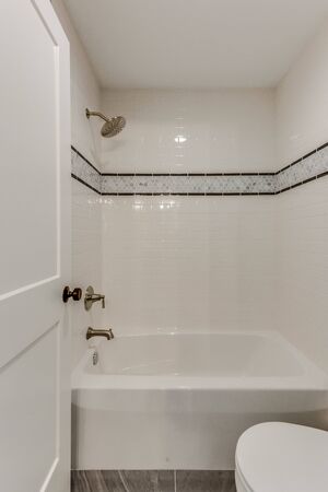 Tasteful tiling in shower in newly built home