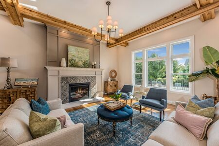 Open family room with coffered ceiling that enhances trim detail