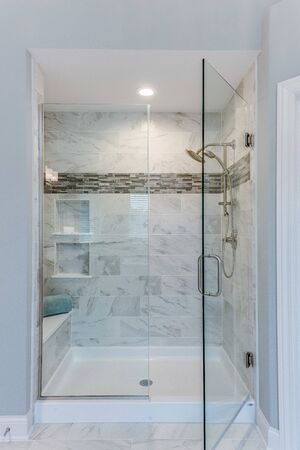 Luxurious master suite with a beautiful shower and amenties