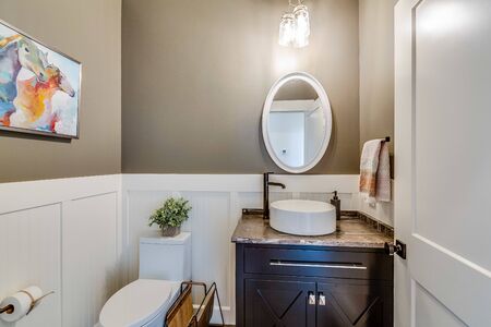 Half bathroom for quick access when entering the homeの写真素材