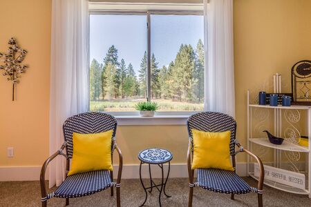 Sitting area of master bedroom with stunning viewの写真素材