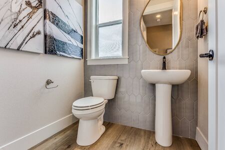 Lovely pedestal sink in half bathroom