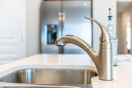Close up view of a faucet.