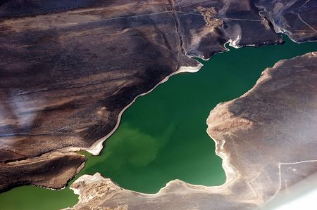 An aerial view of the andes mountains and a lakeの写真素材