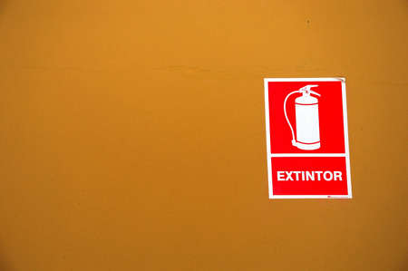Spanish fire extinguisher sign on a colorful backgroundの写真素材